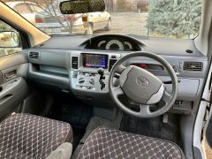 Photo of the vehicle Toyota Raum