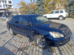 Фото авто Mitsubishi Lancer