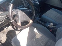 Сүрөт унаа Toyota Carina