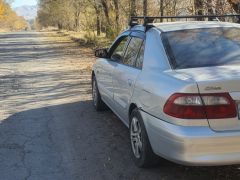 Фото авто Mazda 626