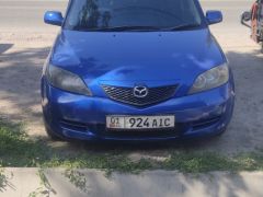 Сүрөт унаа Mazda Demio