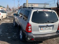 Photo of the vehicle Mazda Tribute