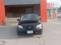 Photo of the vehicle Mazda Demio