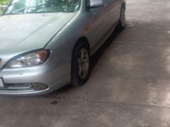 Photo of the vehicle Nissan Primera