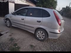 Photo of the vehicle Nissan Almera Tino