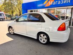 Photo of the vehicle Suzuki Aerio