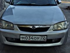 Фото авто Mazda Familia