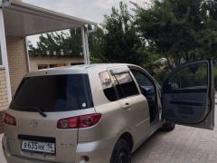 Сүрөт унаа Mazda Demio