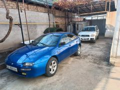 Сүрөт унаа Mazda 323