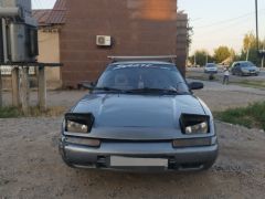 Сүрөт унаа Mazda 323