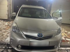 Photo of the vehicle Toyota Prius v (+)