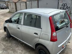 Сүрөт унаа Daihatsu Cuore