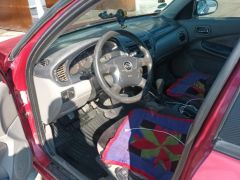 Photo of the vehicle Nissan Almera