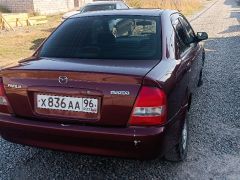 Сүрөт унаа Mazda Familia