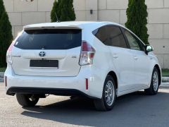 Фото авто Toyota Prius v (+)