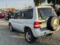 Photo of the vehicle Mitsubishi Pajero iO