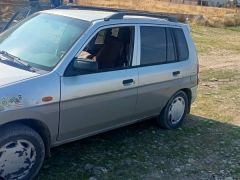 Сүрөт унаа Mazda Demio