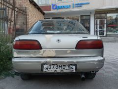 Сүрөт унаа Nissan Presea