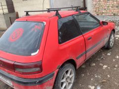 Сүрөт унаа Mazda 323