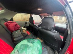 Сүрөт унаа Mazda 323