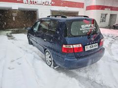 Фото авто Kia Carens