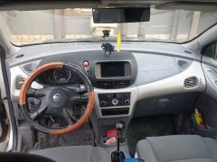 Фото авто Nissan Almera Tino