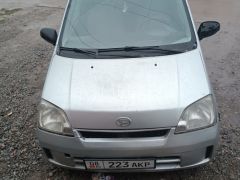 Фото авто Daihatsu Cuore