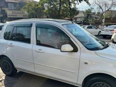 Photo of the vehicle Mazda Demio