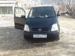 Фото авто Honda Capa