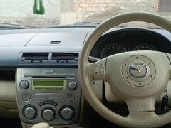 Сүрөт унаа Mazda Demio