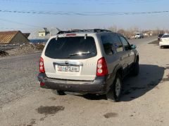 Фото авто Mazda Tribute