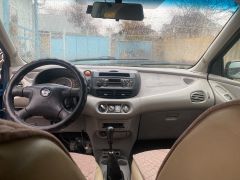 Photo of the vehicle Nissan Almera Tino