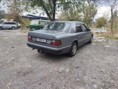 Сүрөт унаа Mercedes-Benz W124