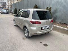 Сүрөт унаа Mazda Demio