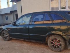 Сүрөт унаа Mazda 323