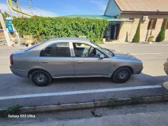 Фото авто Kia Shuma