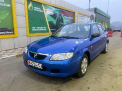 Photo of the vehicle Mazda 323