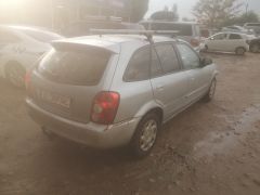 Сүрөт унаа Mazda 323