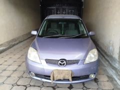 Photo of the vehicle Mazda Demio