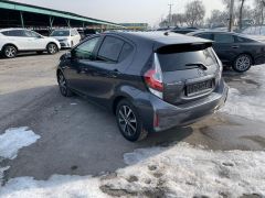 Фото авто Toyota Prius c