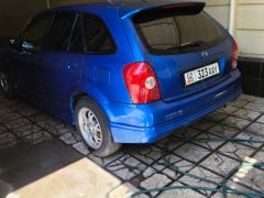 Photo of the vehicle Mazda 323