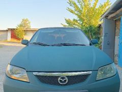 Photo of the vehicle Mazda 323