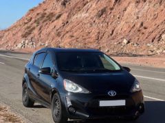 Фото авто Toyota Prius c