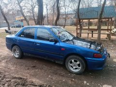 Сүрөт унаа Mazda 323