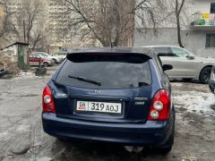 Photo of the vehicle Mazda 323