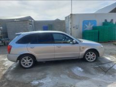 Фото авто Mazda 323