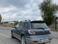 Сүрөт унаа Mitsubishi Outlander