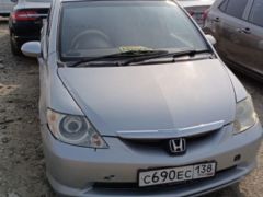 Photo of the vehicle Honda Fit Aria