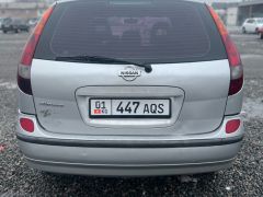 Фото авто Nissan Almera Tino