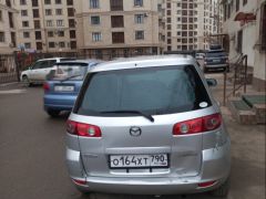 Photo of the vehicle Mazda Demio